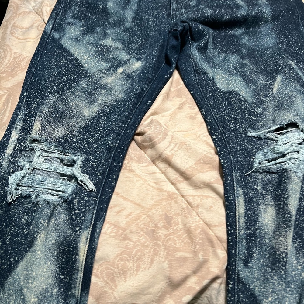 Distressed Blue Jeans